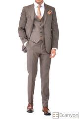 Brown Three Piece Suit Pattern Fabrics. A timeless a brown plain suit that can be styled up for special events or styled down for the office. The matching quality a brown plain waistcoat and trousers are paired with a brown plain suit jacket. You’ll love the patterned lining panels on this suit, especially the one in the jacket’s breast pocket which doubles up as a pocket square. Regular fit